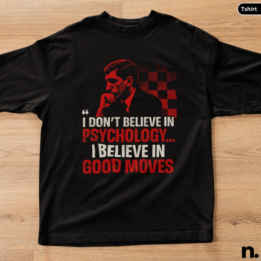 Black t-shirt with red and white graphic and text on a wooden surface