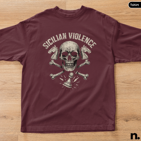 Maroon t-shirt with 'Sicilian Violence' graphic design on a wooden surface