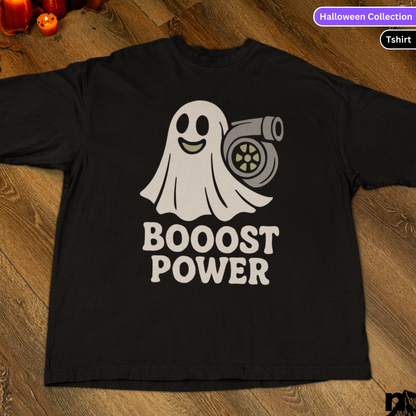 Black t-shirt with a ghost and turbo graphic and 'BOOSt POWER' text on a wooden surface.