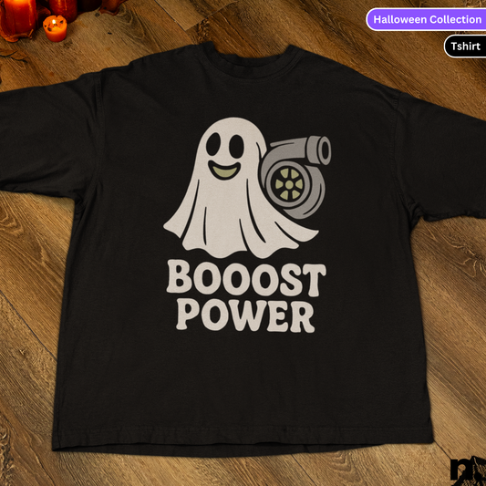Black t-shirt with a ghost and turbo graphic and 'BOOSt POWER' text on a wooden surface.