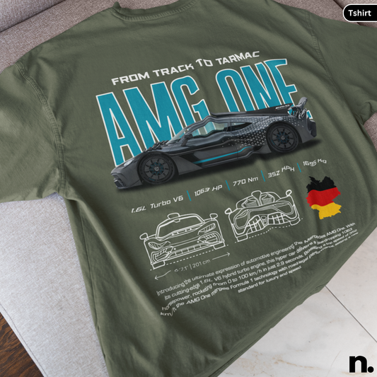 Green t-shirt with car graphic and text on a surface
