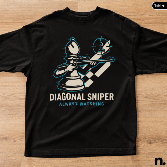 Black t-shirt with a chess-themed graphic and text on a wooden surface