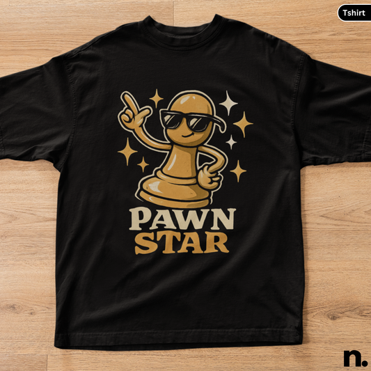 Black t-shirt with 'Pawn Star' design on a wooden surface