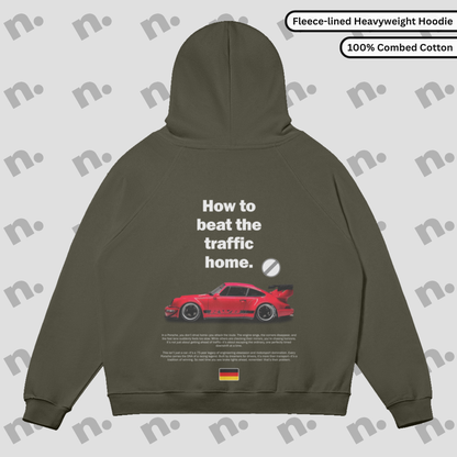 Flat lay of the 911 RWB Autobahn Sun Faded Hoodie with an RWB Porsche graphic and 'How to Beat the Traffic Home' slogan.