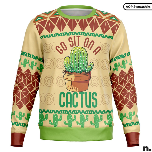 Beige sweater with cactus design and text 'Go sit on a cactus' on a white background