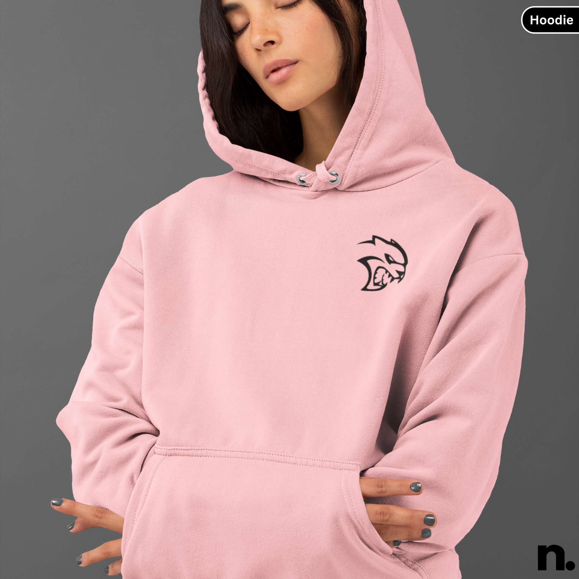 Person wearing a pink hoodie with a logo on a gray background SRT Charger Poster Style