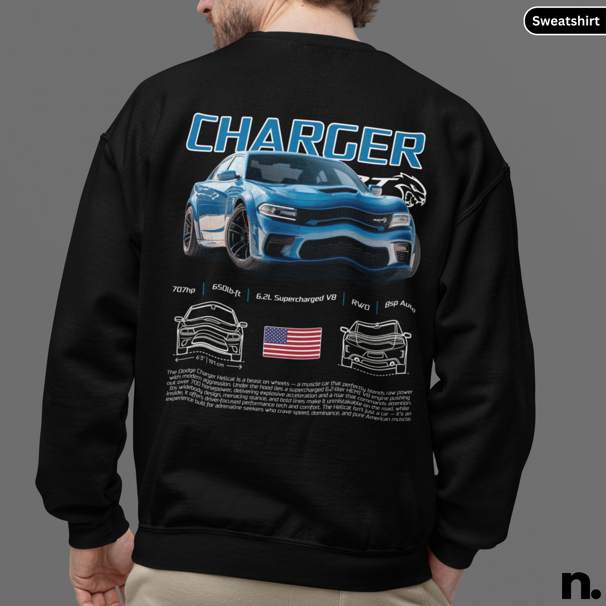 Black sweatshirt with a blue car design and text on the back, worn by a person.