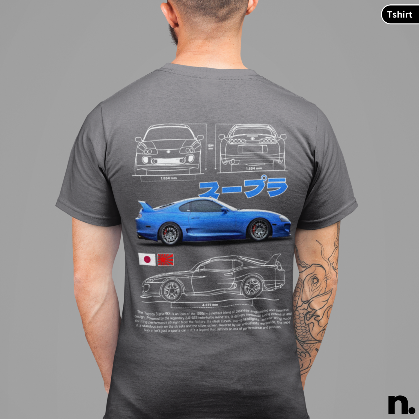 Gray t-shirt with car design on the back, worn by a person against a gray background