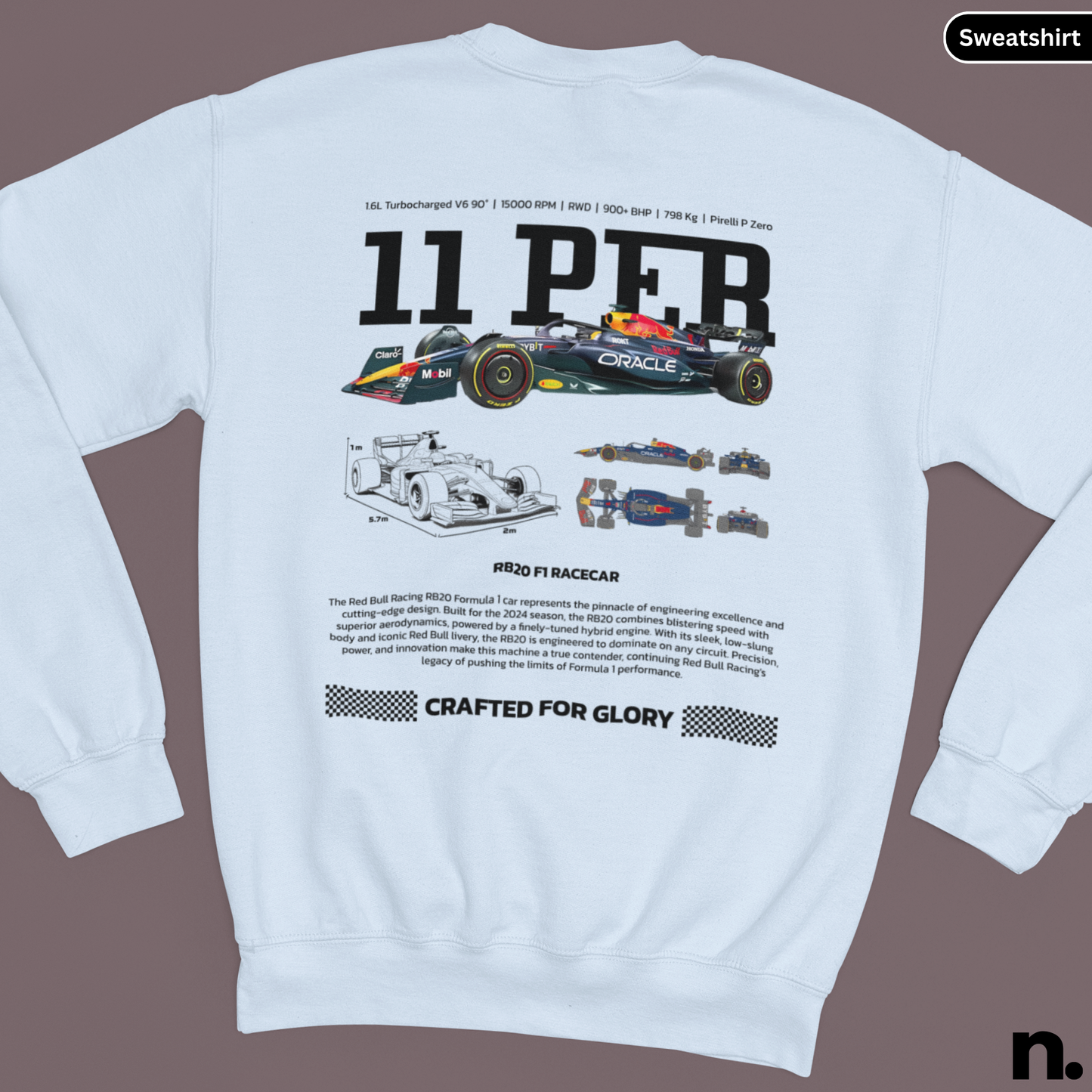 White sweatshirt with racing car design and text on a brown background