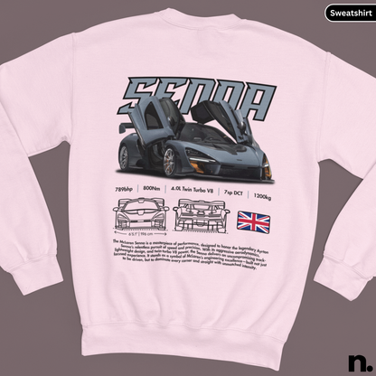 White sweatshirt with a McLaren Senna graphic on the back, featuring technical details and a British flag.