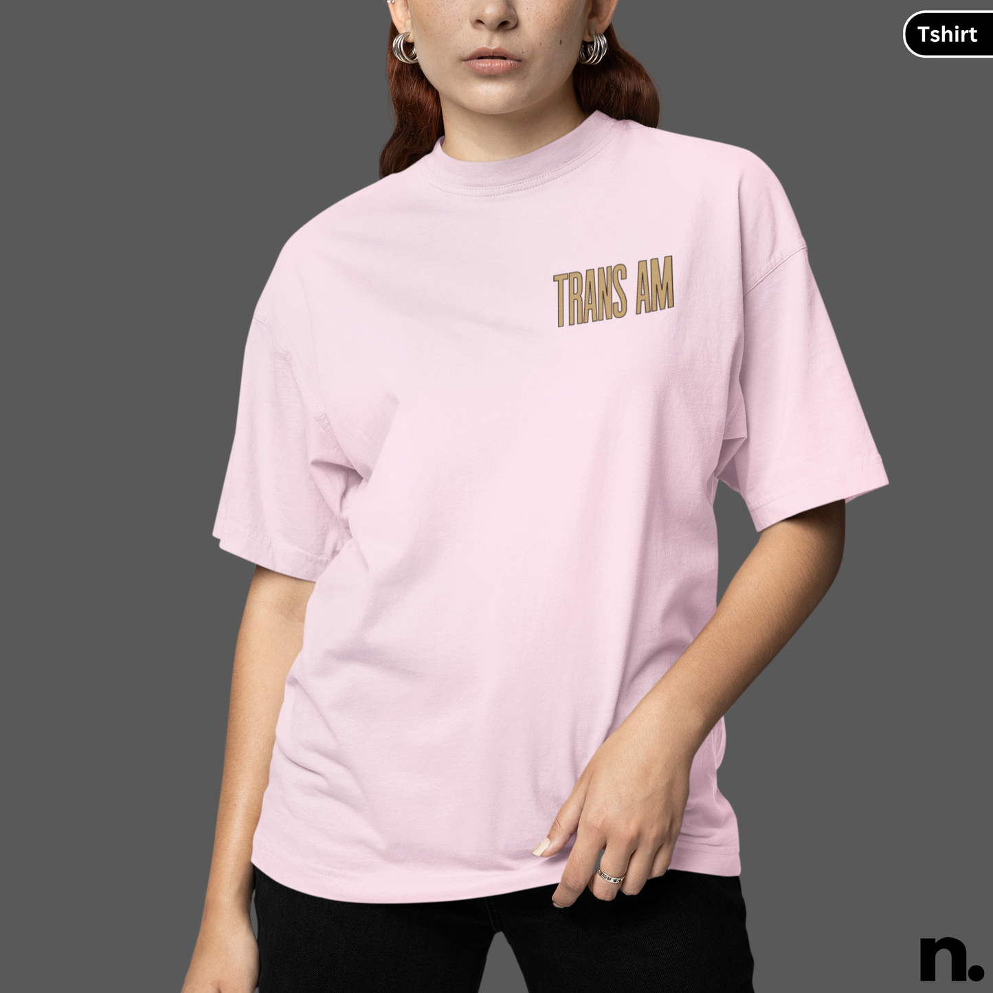 Person wearing a pink t-shirt with 'THANKS A MILLION' text on a gray background