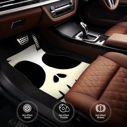 Car interior with a focus on the center console and cup holders.