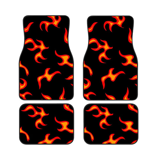 Set of four car floor mats with flame pattern on a black background