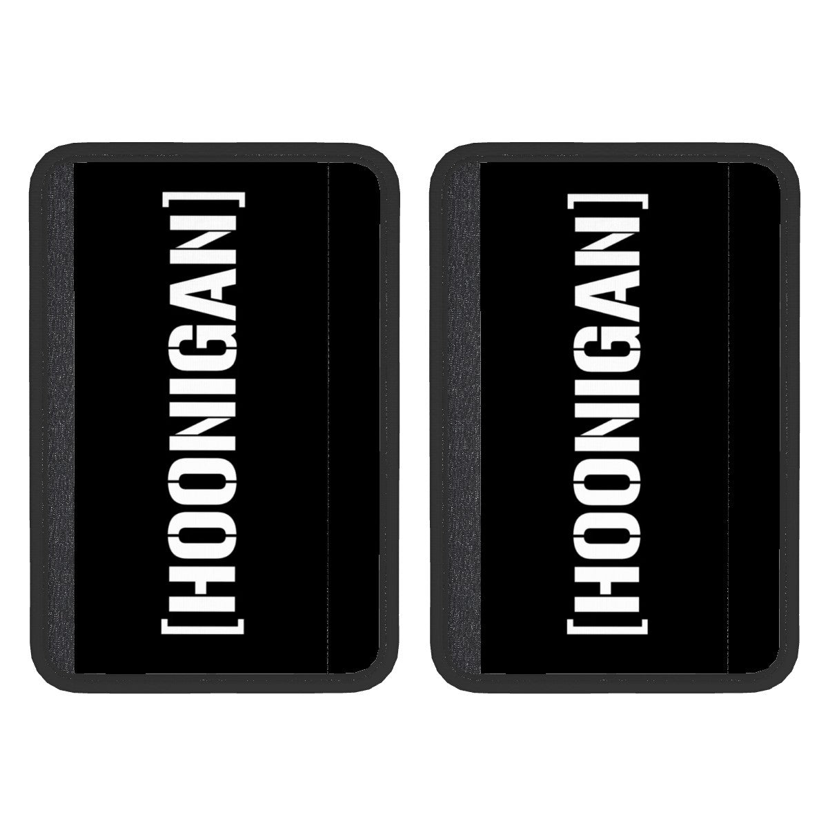 Two black neoprene seat belt cover pads with the white text 'HOONIGAN' on them, displayed against a white background.