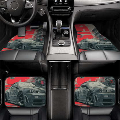 Car interior with red and black car-themed floor mats.