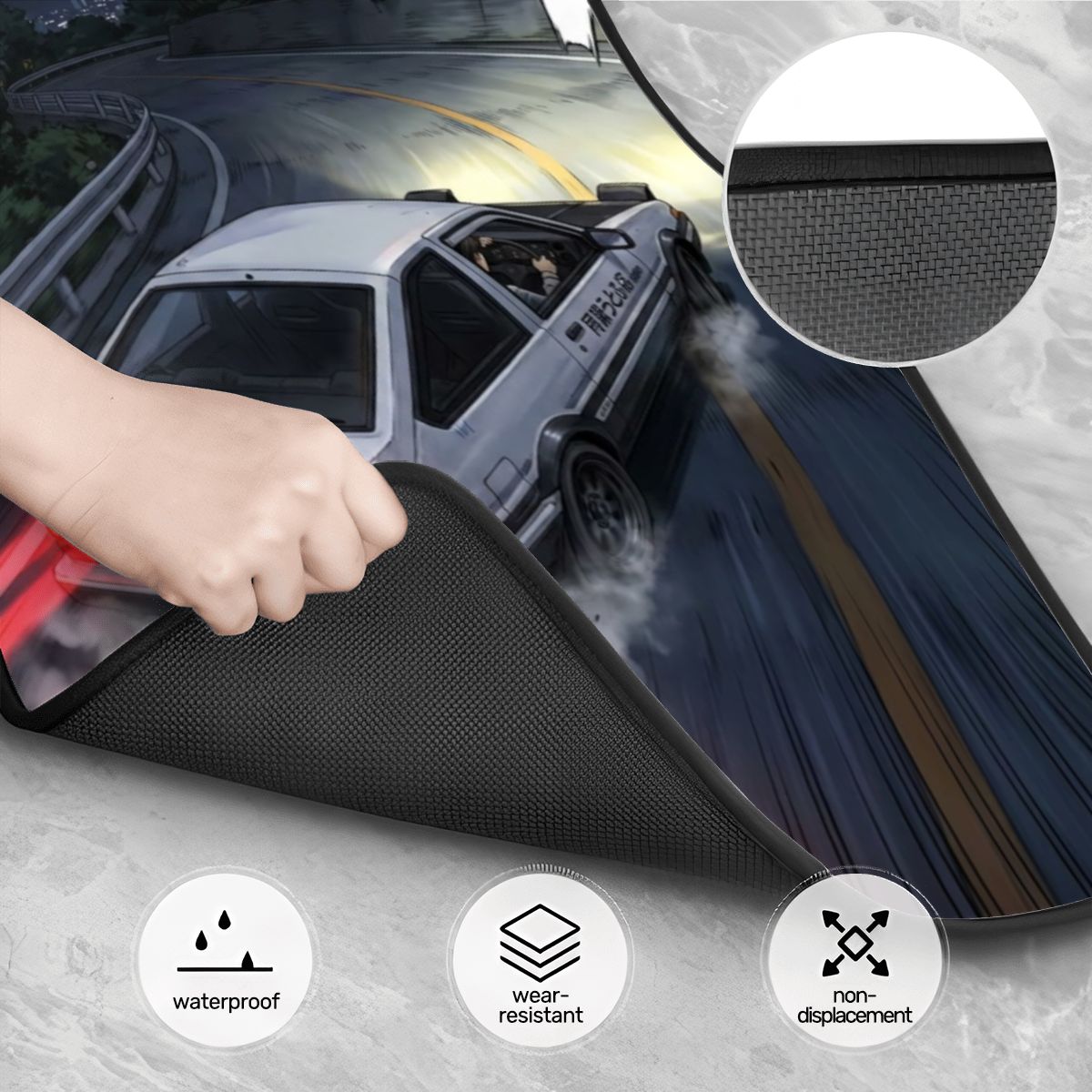 Car window screen with a hand holding it, road scene in the background