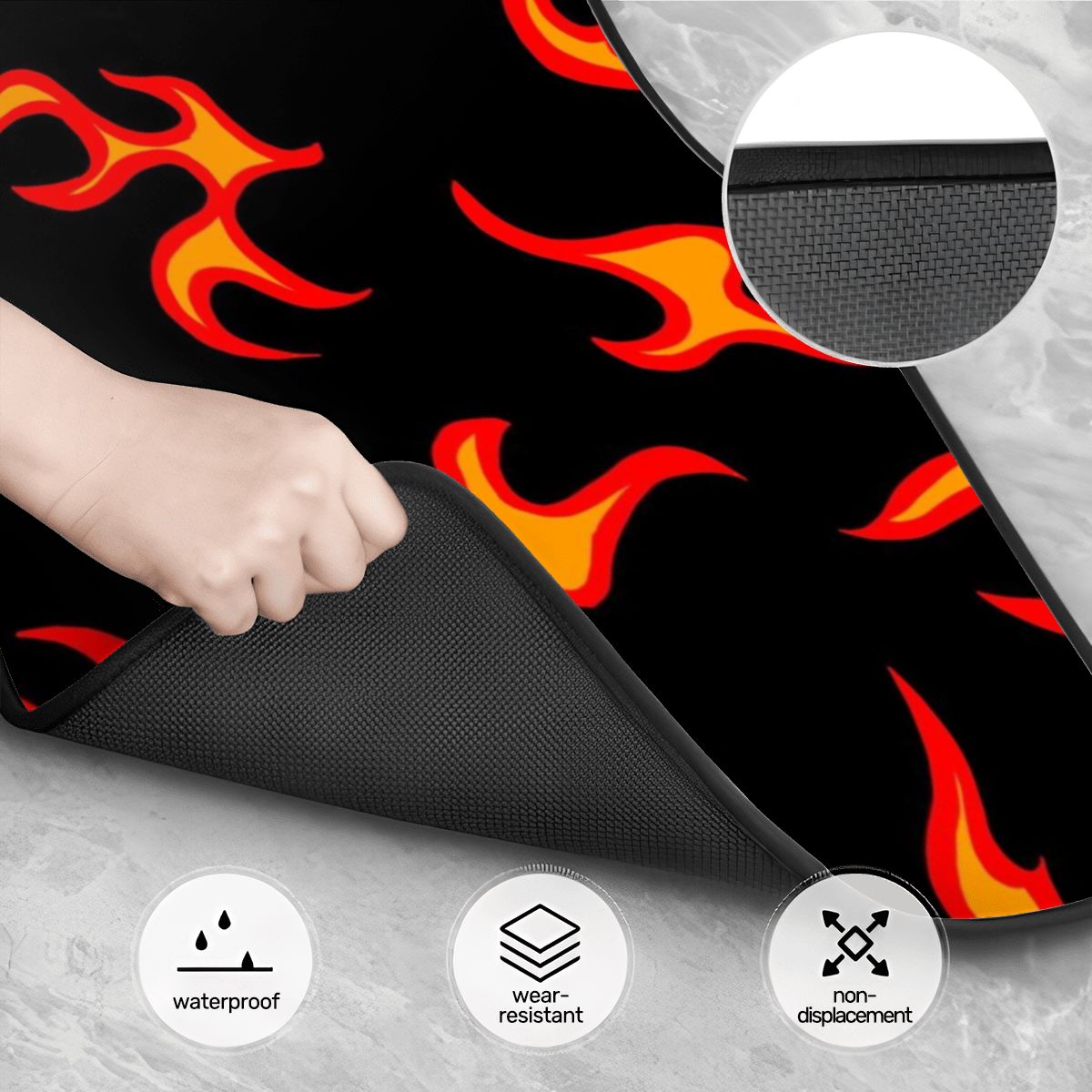Flame-patterned mat with a hand holding it, showing features like waterproof, wear-resistant, and non-displacement.